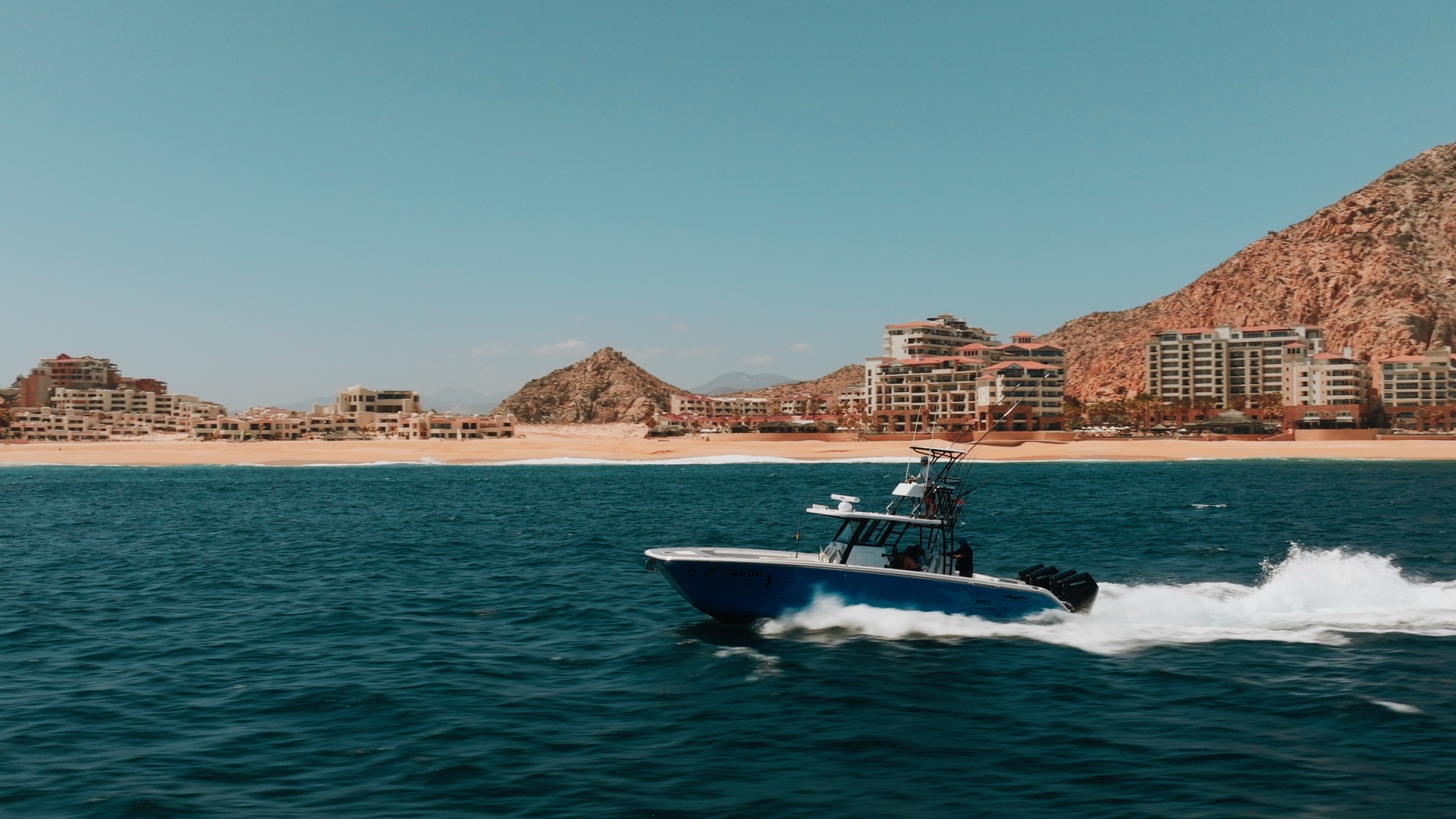 Pacific Icon yacht footage still showing luxury vessel on the water with scenic backdrop.